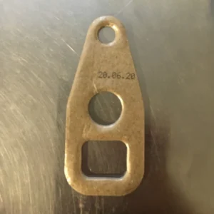 Vintage-style bottle opener with imprinted date