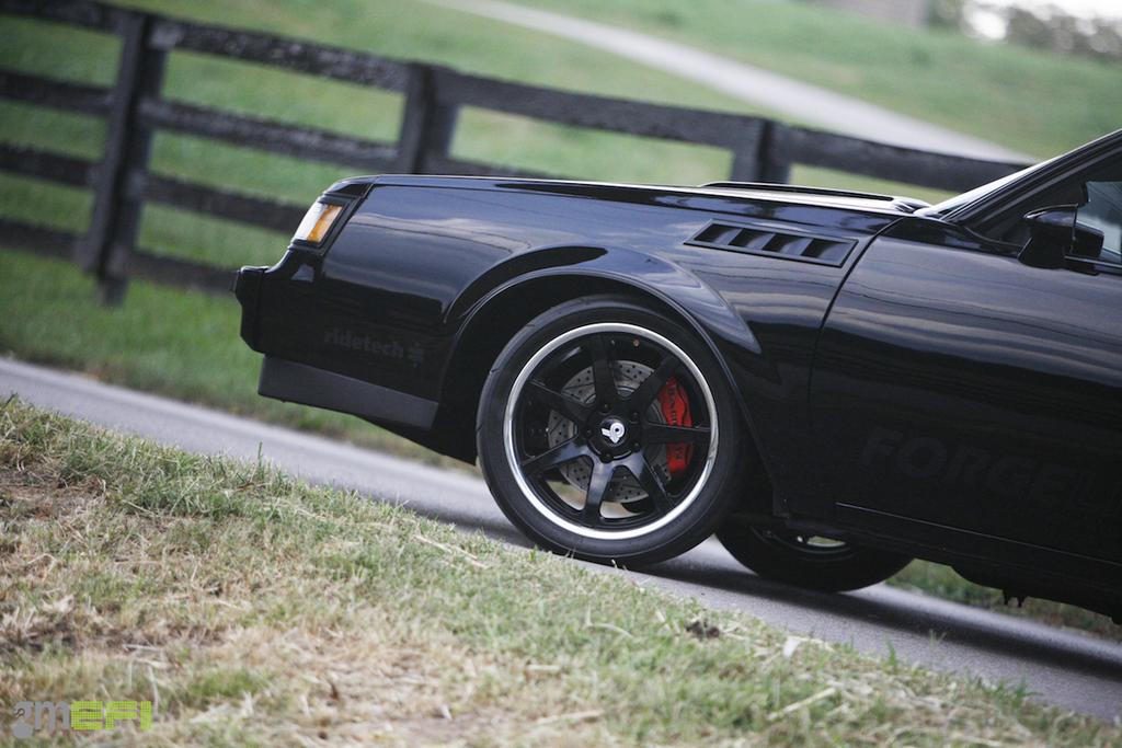 Classic black car with performance upgrades
