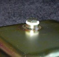Hex bolt with washer on metal
