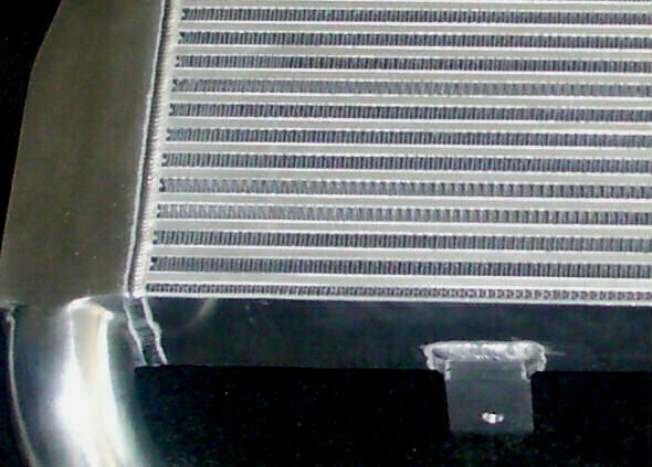 Automotive intercooler core and pipe