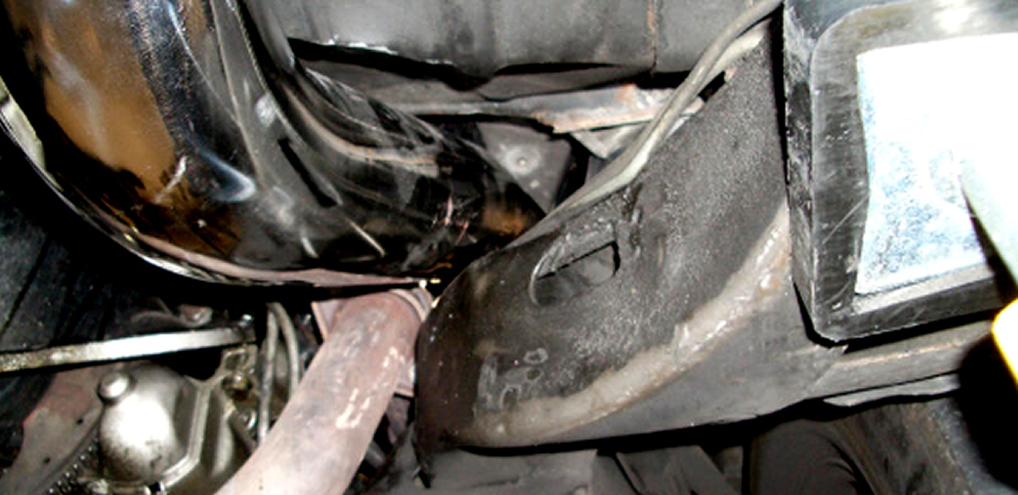 Vehicle underbody showing dirty components