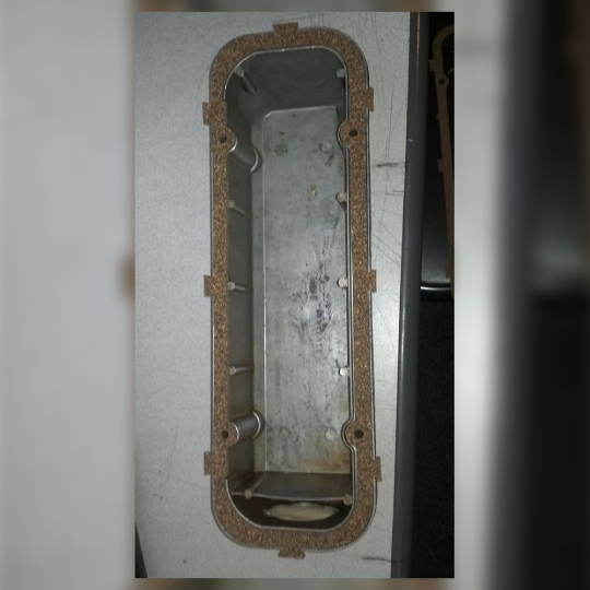 Engine valve cover with gasket