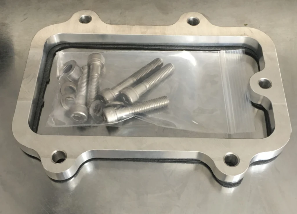 Metal cover and fastener kit