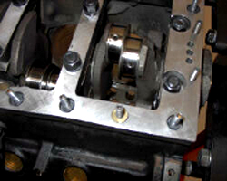 Engine block with crankshaft and main caps