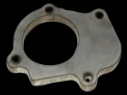 Automotive engine spacer plate